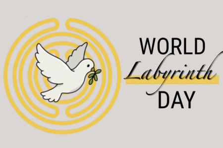 Yellow labyrinth with white peace dove in center